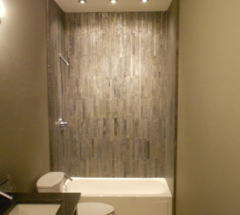 Shower with a nice design on the wall in a Custom Bathroom in Pheonix
