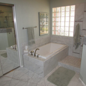 Bathroom Renovations with white tile and bath in Glendale